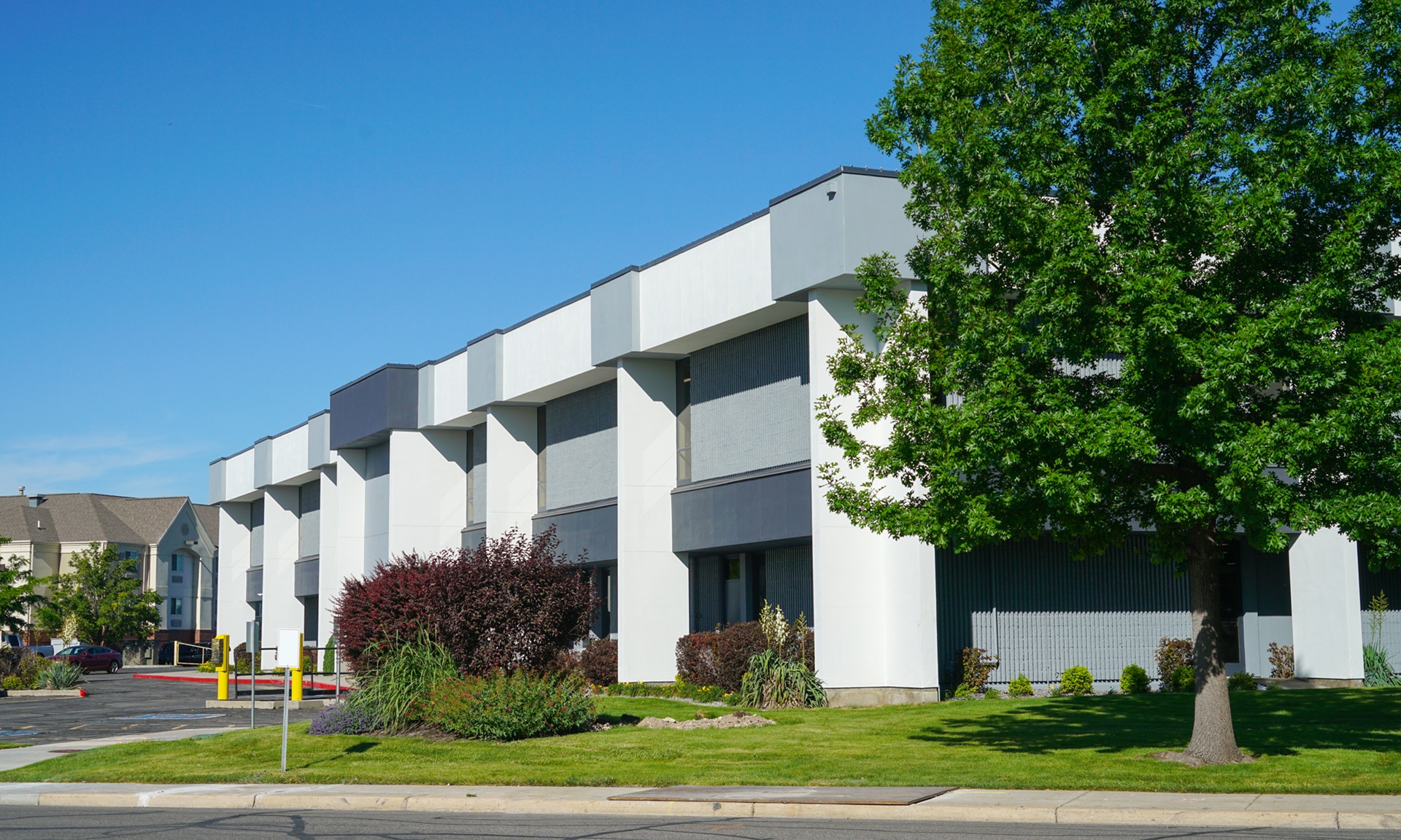 Exterior View Of Office Building In Industrial Area
